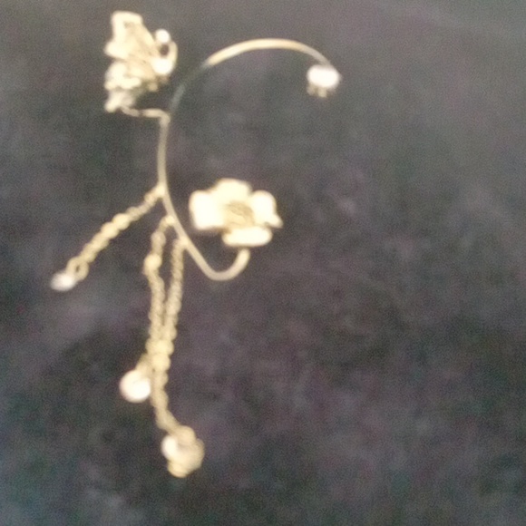 Silver right and left ear cuff butterfly at top flower on bottom - Picture 4 of 4